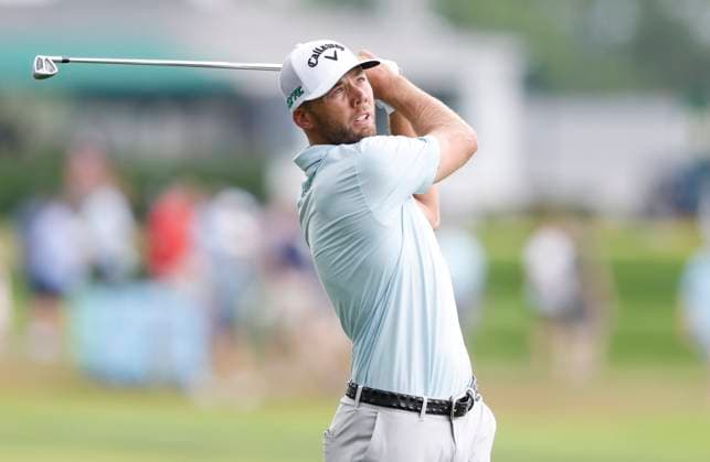 Sam Burns hits his approach shot to the 1st green during the third round of the 125th U.S. Open Golf Championship at Oakmont Country Club in Oakmont, Pennsylvania on Saturiday, June 14, 2025.  PIT20250614606 JOHNxANGELILLO