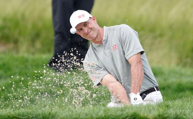 Adam Scott of Australia hits out of a bunker on the 8th hole during the third round of the 125th U.S. Open Golf Championship at Oakmont Country Club in Oakmont, Pennsylvania on Saturiday, June 14, 2025.  PIT20250614630 JOHNxANGELILLO