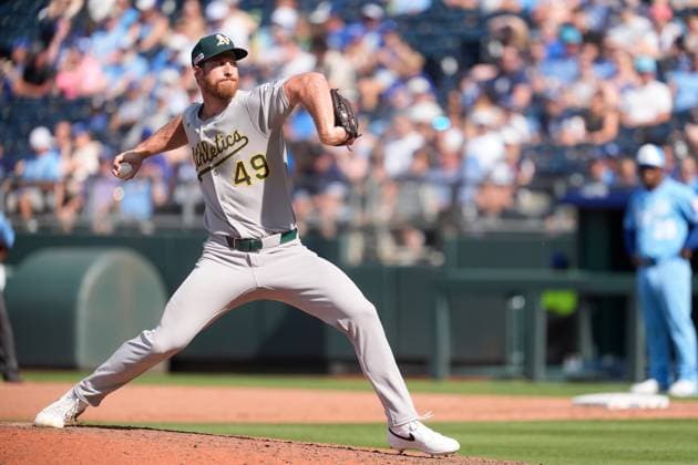 June 14, 2025: Athletics pitcher Michael Kelly (49) delivers a pitch against the Royals at Kauffman Stadium Kansas City, Missouri. CSM. Kansas City United States - ZUMAc04_ 20250614_zma_c04_003 Copyright: xJonxRobichaudx