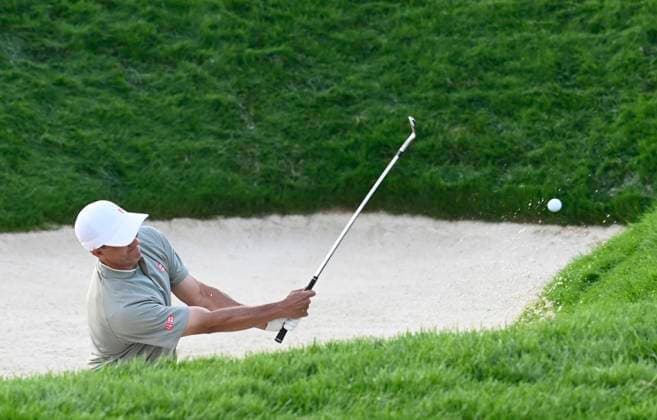 Adam Scott of Australia hits out of a bunker on the 17th hole during the third round of the 125th U.S. Open Golf Championship at Oakmont Country Club in Oakmont, Pennsylvania on Saturiday, June 14, 2025.  PIT20250614682 ARCHIExCARPENTER