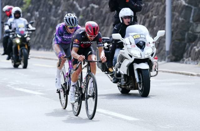 15 06 2025 Switzerland Tour de Suisse Men 2025 Stage Kuessnacht Kuesnacht Picture The runaways in front Julian Alphilippe FRA Team Tudor, behind Felix Engelhardt Team Jayco Alula Accompanied by TV Motorrad Aktion