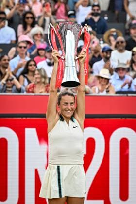 15th June 2025; HSBC Championships, Queens Club, West Kensington, London, England: HSBC Womens Championships Queens Club, Day 7; Tatjana Maria (GER) celebrates by lifting the new women s trophy after winning the womens singles final against Amanda Anisimova (USA)  ActionPlus12801495 GodfreyxPitt