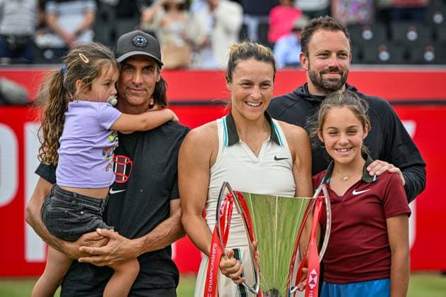 15th June 2025; HSBC Championships, Queens Club, West Kensington, London, England: HSBC Womens Championships Queens Club, Day 7; Tatjana Maria (GER) celebrates with her coach and family by lifting the new women s trophy after 15th June 2025; HSBC Championships, Queens Club, West Kensington, London, England: HSBC Womens Championships Queens Club, Day 7; Tatjana Maria (GER) celebrates by lifting the new women s trophy after winning the womens singles final against Amanda Anisimova (USA)  ActionPlus12801500 GodfreyxPitt