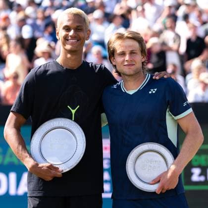 2025-06-15 2025 Libema Open Grass Court Championships ROSMALEN, NETHERLANDS - JUNE 15: Gabriel Diallo of Canada and Zizou Bergs of Belgium with their trophy during Day Seven of 2025 Libema Open Grass Court Championships at Autotron on June 15, 2025 in Rosmalen, Netherlands. Rosmalen Autotron Netherlands Content not available for redistribution in The Netherlands directly or indirectly through any third parties. Copyright: xJorisxVerwijstx