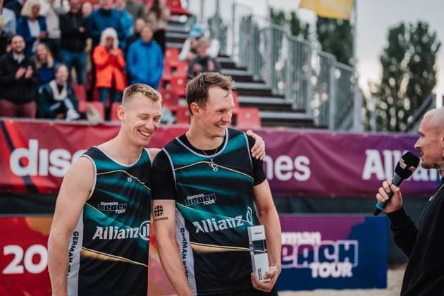 Beach volleyball men Allianz German Beach Tour 2025 Tourstop Bremen 15 06 2025 f l Jonas Reinhardt and Robin Sowa in an interview after winning the tournament Bremen Waterfront Bremen Germany