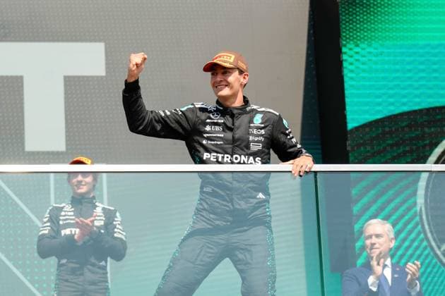 George Russell (GBR), Mercedes-AMG Petronas F1 Team, 63 celebrates after winning the race as Kimi Antonelli (ITA), Mercedes-AMG Petronas F1 Team, 12 (left) stands on the third place platform and Canadian Prime Minister Mark Carney (right) applauds during Pirelli Grand Prix du Canada 2025, Formula 1 Championship in Montreal, Canada, June 15 2025  Copyright: xScottxColeman IPAxSportx xipa-agency.netx xx IPA_59107823 IPA_Agency_IPA59107823