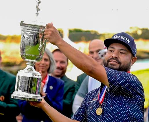 J.J. Spaun holds the trophy after winning the 125th U.S. Open Golf Championship at Oakmont Country Club in Oakmont, Pennsylvania on Sunday, June 15, 2025. Spaun won with a 64-foot birdie putt on the 18th hole and finished at even par for the tournament.  PIT20250615754 ARCHIExCARPENTER