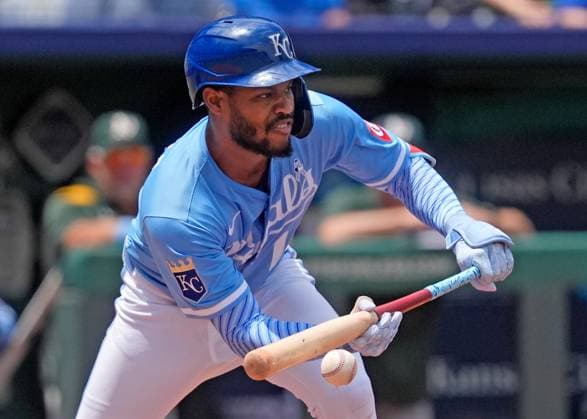June 15, 2025: Kansas City Royals third base Maikel Garcia (11) lays down a sacrifice bunt to advance the runner against the Athletics at Kauffman Stadium Kansas City, Missouri. CSM. Kansas City United States - ZUMAc04_ 20250615_zma_c04_092 Copyright: xJonxRobichaudx