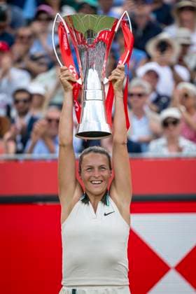 (250616) -- LONDON, June 16, 2025 -- Tatjana Maria of Germany celebrates with the trophy during the awarding ceremony after the women s singles final between Amanda Anisimova of the United States and Tatjana Maria of Germany at the Queen s Club Championships in London, Britain, June 15, 2025. (Photo by Xinhua) (SP)BRITAIN-LONDON-TENNIS-QUEEN S CLUB CHAMPIONSHIPS StephenxChung 