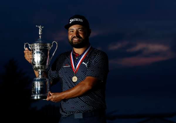 J.J. Spaun holds the trophy after winning the 125th U.S. Open Golf Championship at Oakmont Country Club in Oakmont, Pennsylvania on Sunday, June 15, 2025. Spaun won with a 64-foot birdie putt on the 18th hole and finished at one under par for the tournament.  PIT202506152007 JOHNxANGELILLO