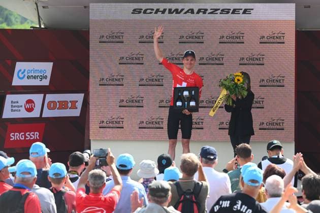 Tour de Suisse 2025 Stage 2 SCHWARZSEE LAC NOIR, SWITZERLAND - JUNE 16 : Schmid Mauro (SUI) of Team Jayco AlUla best Swiss Rider on the podium after stage 2 of the 88th edition of Tour de Suisse an UCI World Tour 2.UWT cycling road race stage for Men Elite of 177 km with start in Aarau and finish in Schwarzsee Lac Noir on June 16, 2025 in Schwarzsee Lac Noir, Switzerland, 16 06 2025 ( Motordriver Kenny Verfaillie - Schwarzsee Lac Noir Switzerland  Copyright: xVincentxKalutx