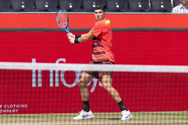 17th June 2025; HSBC Championships, Queens Club, West Kensington, London, England: HSBC Mens Championships Queens Club, Day 2; Jack Draper (GBR) plays a backhand shot against Jenson Brooksby (USA)  ActionPlus12802023 IanxStephen
