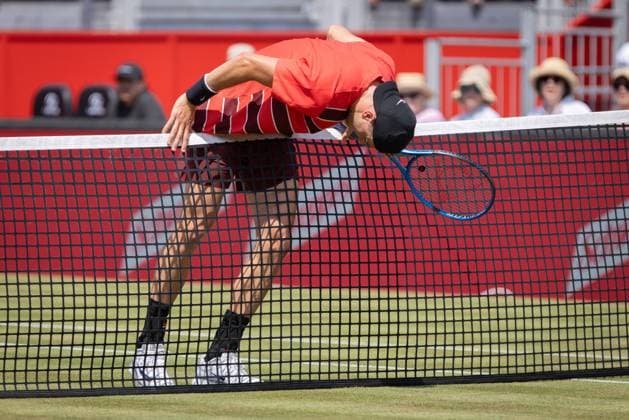 17th June 2025; HSBC Championships, Queens Club, West Kensington, London, England: HSBC Mens Championships Queens Club, Day 2; Jack Draper (GBR) falls into the net against Jenson Brooksby (USA)  ActionPlus12802034 IanxStephen