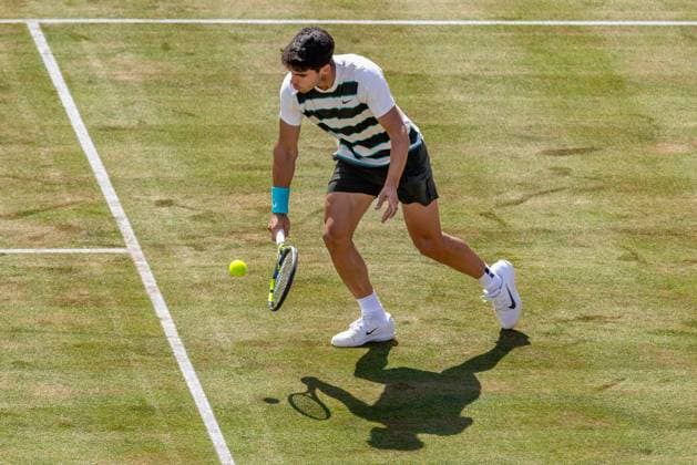 17th June 2025; HSBC Championships, Queens Club, West Kensington, London, England: HSBC Mens Championships Queens Club, Day 2; Carlos Alcaraz (ESP) plays a drop shot against Adam Walton (AUS)  ActionPlus12802089 IanxStephen