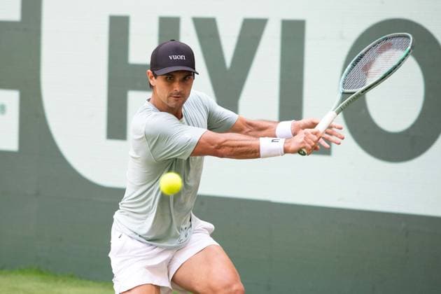 Marcos GIRON USA Action Marcos Giron USA vs Alexander Zverev GER Tennis Terra Wortmann Open 2025 on 18 06 2025 at the OWL Arena Halle Westfalen, Germany Â