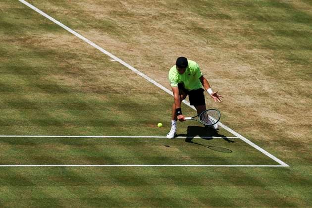 18th June 2025; HSBC Championships, Queens Club, West Kensington, London, England: HSBC Mens Championships Queens Club, Day 3; Jakub Mensik (CZE) plays a backhand shot against Roberto Bautista Agut (ESP)  ActionPlus12802229 HenningxVonxJagow