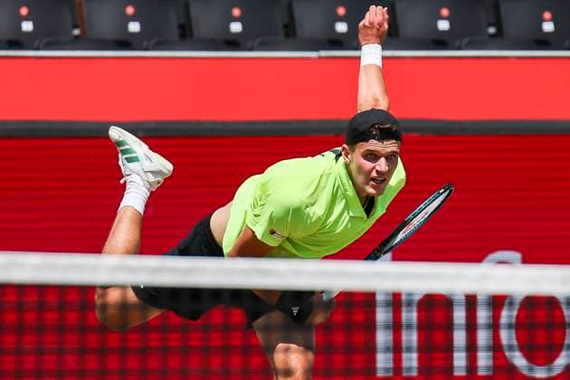 18th June 2025; HSBC Championships, Queens Club, West Kensington, London, England: HSBC Mens Championships Queens Club, Day 3; Jakub Mensik (CZE) serves against Roberto Bautista Agut (ESP)  ActionPlus12802233 HenningxVonxJagow