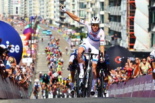Belgian Jasper Philipsen of Alpecin-Deceuninck celebrates as he crosses the finish line to win the first stage of the Baloise Belgium Tour cycling race, 198km from Merelbeke-Melle to Knokke-Heist, Wednesday 18 June 2025. The Baloise Belgium Tour takes place from 18 to 22 June. DAVIDxPINTENS  x127333904x