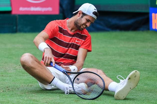 Tennis ATP Tour 500 Terra Wortmann Open 2025 on 18 06 2025 in the OWL ARENA in Halle Westf Karen Khachanov sits injured on the floor xJRx