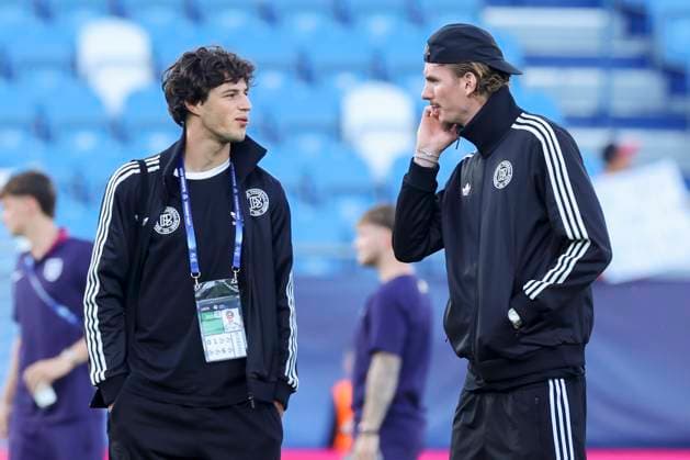Merlin Roehl Germany and Nick Woltemade Germany talk together, UEFA European Under 21 Championship 2025 Group Stage, England v Germany, Nitra Stadium on June 18, 2025 in Nitra, Slovakia Photo by Marco Steinbrenner DeFodi Images Merlin Roehl Germany and Nick Woltemade Germany talk together, UEFA European Under 21 Championship 2025 Group Stage, England v Germany, Nitra Stadium, June 18, 2025 in Nitra, Slovakia Photo by Marco Steinbrenner DeFodi Images
