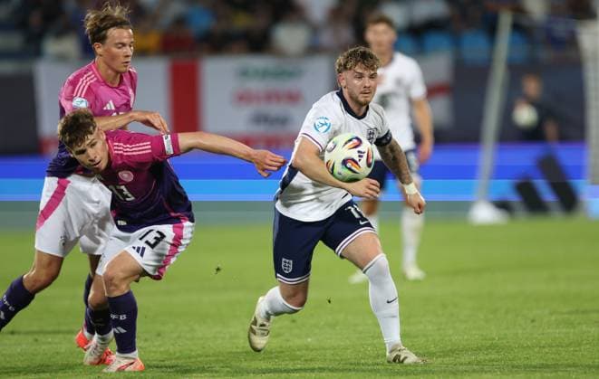 Harvey Elliott of England Under 21 and Lukas Ullrich of Germany Under 21 in action England U21, U 21 v Germany U21, UEFA Under 21 European Championship, EM, Europameisterschaft 2025, Group B, Football, Nitra Stadium, Nitra, Slovakia - 18 Jun 2025 EDITORIAL USE ONLY No use with unauthorised audio, video, data, fixture lists, club league logos or live services. Online in-match use limited to 120 images, no video emulation. No use in betting, games or single club league player publications. Copyright: xNikolaxKrstic Shutterstockx 15363358bm