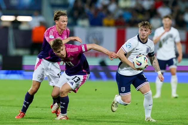 Caspar Jander Germany , Lukas Ullrich Germany and Harvey Elliott England battle for the ball, UEFA European Under 21 Championship 2025 Group Stage, England v Germany, Nitra Stadium on June 18, 2025 in Nitra, Slovakia Photo by Marco Steinbrenner DeFodi Images Caspar Jander Germany , Lukas Ullrich Germany and Harvey Elliott England battle for the ball, UEFA European Under 21 Championship 2025 Group Stage, England v Germany, Nitra Stadium, June 18, 2025 in Nitra, Slovakia Photo by Marco Steinbrenner DeFodi Images