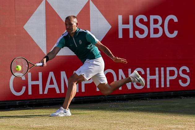 18th June 2025; HSBC Championships, Queens Club, West Kensington, London, England: HSBC Mens Championships Queens Club, Day 3; Daniel Evans (GBR) plays a forehand shot against Brandon Nakashima (USA)  ActionPlus12802404 HenningxVonxJagow