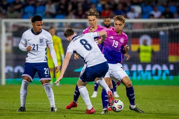 ENGLAND U21, U 21 - GERMANY U21 Elliot Anderson, Ethan Nwaneri of England and Nelson Weiper of Germany during the UEFA European Under-21 Championship 2025 Group B football match between England U21 and Germany U21. Stadium Nitra Arena, Nitra, Slovakia, June 18, 2025. Photo by Branislav Racko Copyright: xx 080A8553