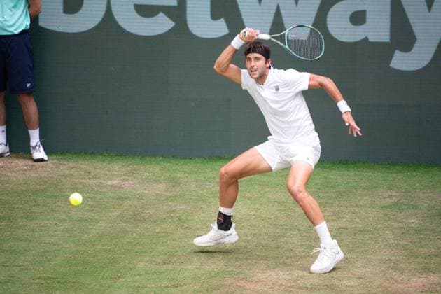 Tomas Martin ETCHEVERRY ARG Action Andrey Rublev RUS vs Tomas Martin Etcheverry ARG Tennis Terra Wortmann Open 2025 on 18 06 2025 at the OWL Arena Halle Westfalen, Germany Â