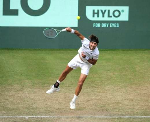 photo Argentinian Tomas Martin ETCHEVERRY all in white defeats Andrey Rublev in 3 thrilling sets Tennis Tournament Terra Wortmann Cup at Gerry Weber Sportpark OWL Arena in Halle Westfalen on Thu 19 06 2025