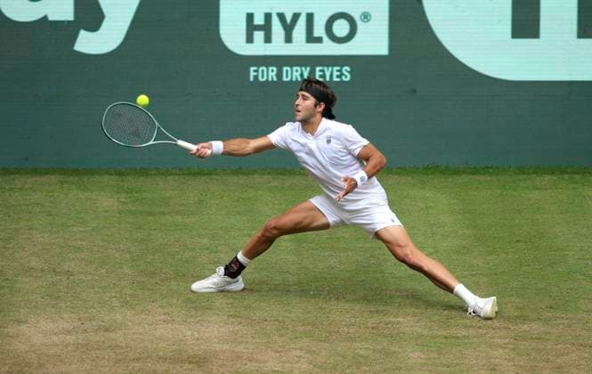 photo Argentinian Tomas Martin ETCHEVERRY all in white defeats Andrey Rublev in 3 thrilling sets Tennis Tournament Terra Wortmann Cup at Gerry Weber Sportpark OWL Arena in Halle Westfalen on Thu 19 06 2025
