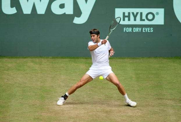 photo Argentinian Tomas Martin ETCHEVERRY all in white defeats Andrey Rublev in 3 thrilling sets Tennis Tournament Terra Wortmann Cup at Gerry Weber Sportpark OWL Arena in Halle Westfalen on Thu 19 06 2025