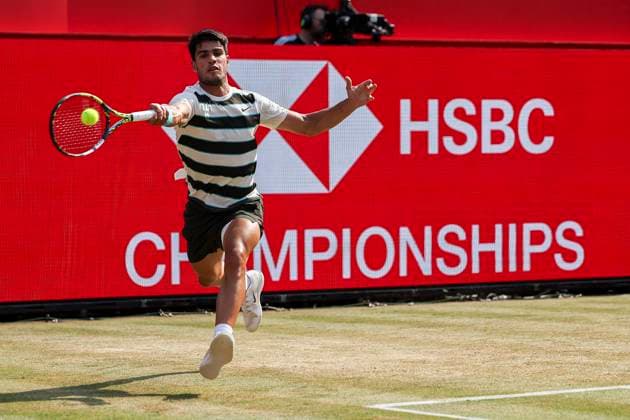 19th June 2025; HSBC Championships, Queens Club, West Kensington, London, England: HSBC Mens Championships Queens Club, Day 4; Carlos Alcaraz (ESP) plays a forehand shot against Jaume Munar (ESP)  ActionPlus12802748 HenningxVonxJagow