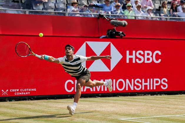 19th June 2025; HSBC Championships, Queens Club, West Kensington, London, England: HSBC Mens Championships Queens Club, Day 4; Carlos Alcaraz (ESP) plays a forehand shot against Jaume Munar (ESP)  ActionPlus12802749 HenningxVonxJagow