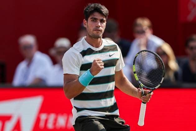 19th June 2025; HSBC Championships, Queens Club, West Kensington, London, England: HSBC Mens Championships Queens Club, Day 4; Carlos Alcaraz (ESP) celebrates winning a point against Jaume Munar (ESP)  ActionPlus12802754 HenningxVonxJagow