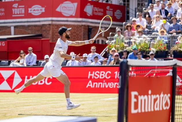Tennis - 2025 ATP, Tennis Herren Men™s HSBC Championships - Quarter-final - Jacob Fearnley (GBR) vs Corentin Moutet (FRA) - The Queen™s Club - Thursday 19th June 2025 Corentin Moutet (FRA) close to the net smashes the return Colorsport Daniel Bearham  csp_ten_quM_db_19062025_