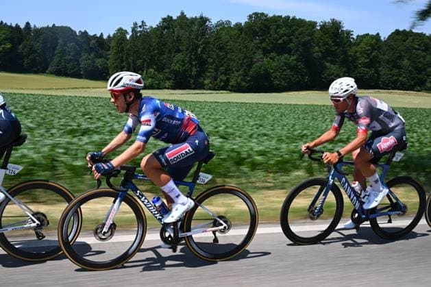 Tour de Suisse 2025 Stage 7 EMMETTEN, SWITZERLAND - JUNE 21 : Van Wilder Ilan (BEL) of Soudal Quick-Step a nd Dillier Silvan (SUI) of Alpecin - Deceuninck in action during stage 7 of the 88th edition of Tour de Suisse an UCI World Tour 2.UWT cycling road race stage for Men Elite of 207.3 km with start in Neuhausen am Rheinfall and finish in Emmetten on June 21, 2025 in Emmetten, Switzerland, 21 06 2025 ( Motordriver Kenny Verfaillie - Emmetten Switzerland  Copyright: xVincentxKalutx
