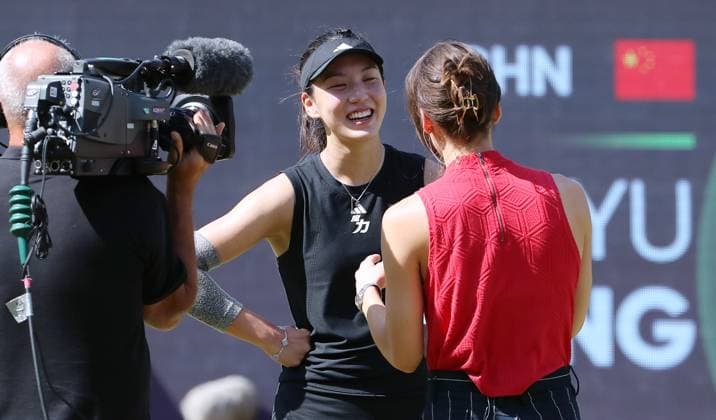 Wang Xinyu CHN laughs in interview after victory against Lyudmila Samsonova RUS at Steffi Graf Stadium Sport Semifinal HYLO Berlin Tennis Open Women on grass 21 06 2025
