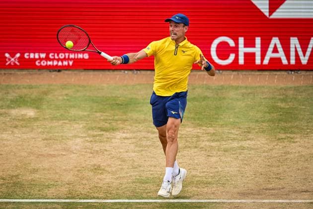 21st June 2025; HSBC Championships, Queens Club, West Kensington, London, England: HSBC Mens Championships Queens Club, Day 6; Roberto Bautista Agut (ESP) hits a forehand in his semi final match against Carlos Alcaraz (ESP)  ActionPlus12803825 GodfreyxPitt