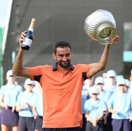 21st June 2025; Lexus Nottingham Tennis Centre, Nottingham, England; Lexus Nottingham Open, Day 6; mens singles champion Marin Cilic celebrates with the trophy and champagne  ActionPlus12803866 PaulxBonser