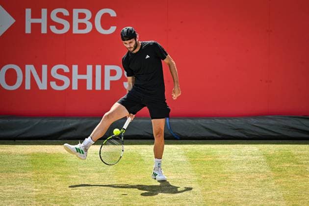 21st June 2025; HSBC Championships, Queens Club, West Kensington, London, England: HSBC Mens Championships Queens Club, Day 6; Jacob Fearnley (GBR) hits a hotdog shot in his semi final match with his partner Cameron Norrie (GBR) against Nikola Mektic (CRO) and Michael Venus (NZL)  ActionPlus12803875 GodfreyxPitt