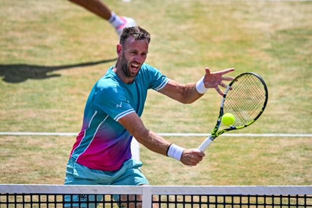 21st June 2025; HSBC Championships, Queens Club, West Kensington, London, England: HSBC Mens Championships Queens Club, Day 6; Michael Venus (NZL) hits a volley in his semi final match with his partner Nikola Mektic (CRO) against Jacob Fearnley (GBR) and Cameron Norrie (GBR)  ActionPlus12803899 GodfreyxPitt