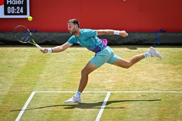 21st June 2025; HSBC Championships, Queens Club, West Kensington, London, England: HSBC Mens Championships Queens Club, Day 6; Michael Venus (NZL) hits a forehand in his semi final match with his partner Nikola Mektic (CRO) against Jacob Fearnley (GBR) and Cameron Norrie (GBR)  ActionPlus12803901 GodfreyxPitt