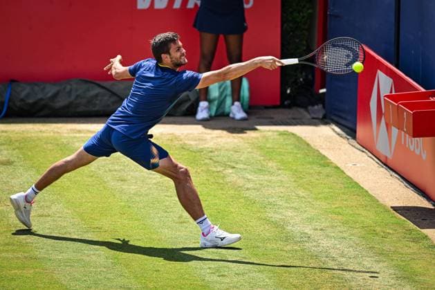 21st June 2025; HSBC Championships, Queens Club, West Kensington, London, England: HSBC Mens Championships Queens Club, Day 6; Nikola Mektic (CRO) hits a backhand in his semi final match with his partner Michael Venus (NZL) against Jacob Fearnley (GBR) and Cameron Norrie (GBR)  ActionPlus12803902 GodfreyxPitt