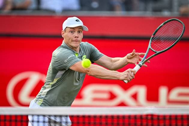 21st June 2025; HSBC Championships, Queens Club, West Kensington, London, England: HSBC Mens Championships Queens Club, Day 6; Harri Heliovaara (FIN) hits a volley in his semi final match with his partner Henry Patten (GBR) against Julian Cash (GBR) and Lloyd Glasspool (GBR)  ActionPlus12803905 GodfreyxPitt