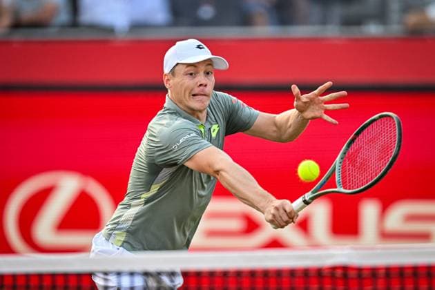 21st June 2025; HSBC Championships, Queens Club, West Kensington, London, England: HSBC Mens Championships Queens Club, Day 6; Harri Heliovaara (FIN) hits a volley in his semi final match with his partner Henry Patten (GBR) against Julian Cash (GBR) and Lloyd Glasspool (GBR)  ActionPlus12803906 GodfreyxPitt
