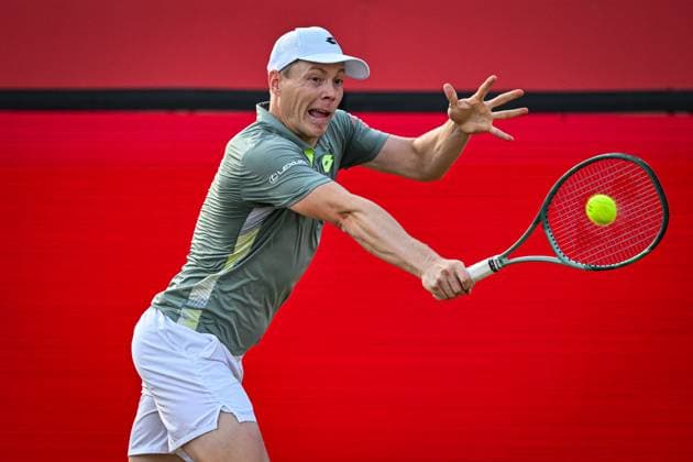 21st June 2025; HSBC Championships, Queens Club, West Kensington, London, England: HSBC Mens Championships Queens Club, Day 6; Harri Heliovaara (FIN) hits a backhand in his semi final match with his partner Henry Patten (GBR) against Julian Cash (GBR) and Lloyd Glasspool (GBR)  ActionPlus12803911 GodfreyxPitt