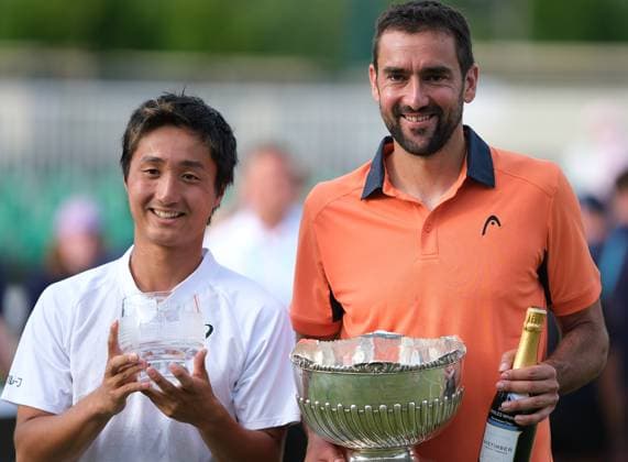 21st June 2025; Lexus Nottingham Tennis Centre, Nottingham, England; Lexus Nottingham Open, Day 6; mens singles winner Marin Cilic and runner up Shintaro Mochhizuki with their trophies after Cilic won the mens final 6-2 6-3  ActionPlus12803922 PaulxBonser