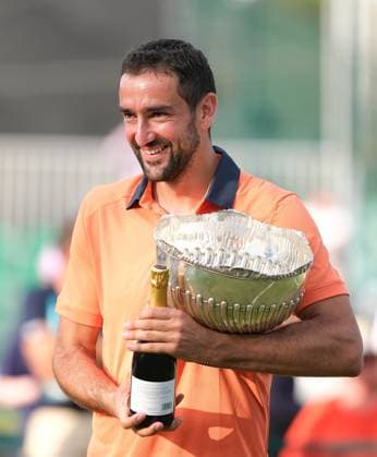 21st June 2025; Lexus Nottingham Tennis Centre, Nottingham, England; Lexus Nottingham Open, Day 6; Marin Cilic winner of the mens final with his trophy and champagne after he won the mens final 6-2 6-3  ActionPlus12803923 PaulxBonser