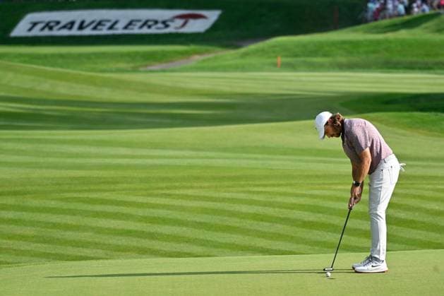 June 21, 2025: Tommy Fleetwood of Southport, England, makes his putt on the 15th green during the third round of the PGA, Golf Herren Travelers Championship golf tournament held at TPC River Highlands in Cromwell CT. Cal Media Cromwell USA - ZUMAc04_ 20250621_zma_c04_020 Copyright: xEricxCanhax